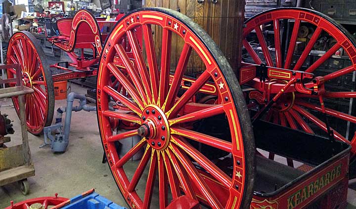 Gilded steamer wheels leaving Fire Gold shop